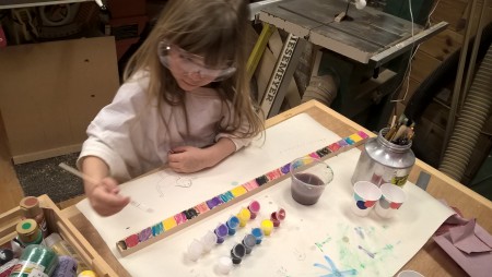 Emma wanted to paint the back of her canjo stick