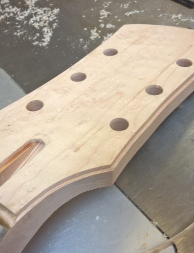 Binding ledge cut in headstock